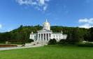 A photo of the Vermont State House in summer